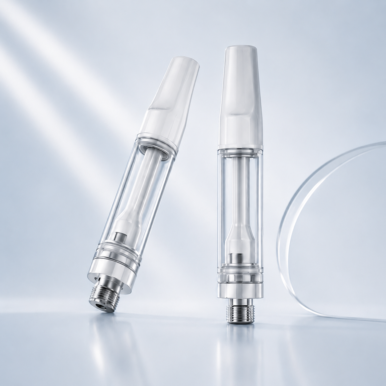 Two transparent 510 cartridges with white mouthpieces and metal connectors